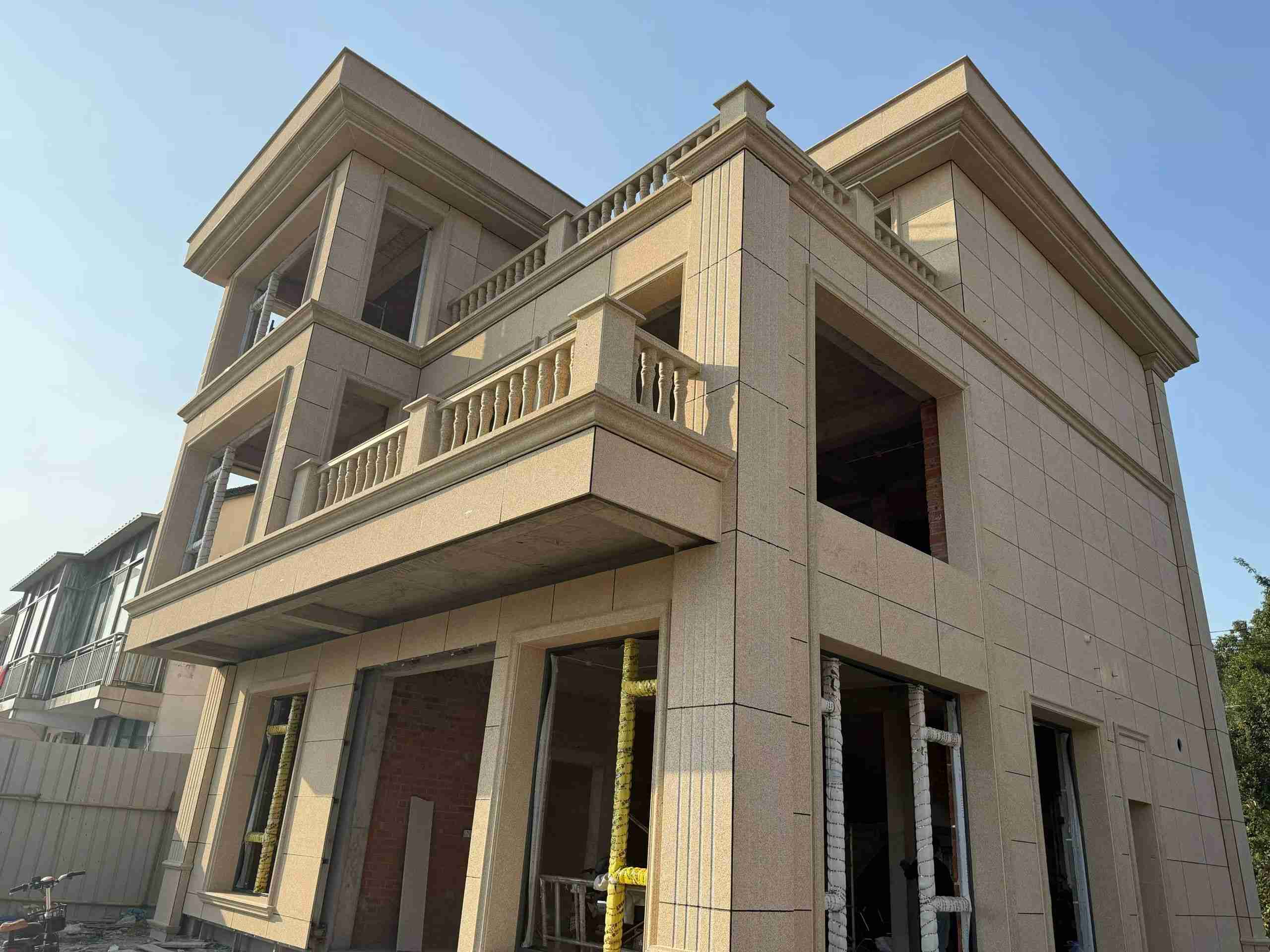 抚州 黄金麻花岗岩石材荔枝面外墙干挂效果展示